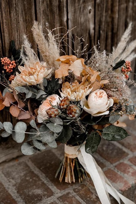 rust and green bouquets for rustic green rustic country wedding